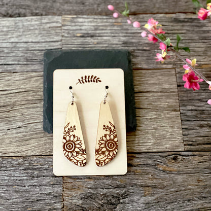 Laser cut and engraved wood sunflower earrings