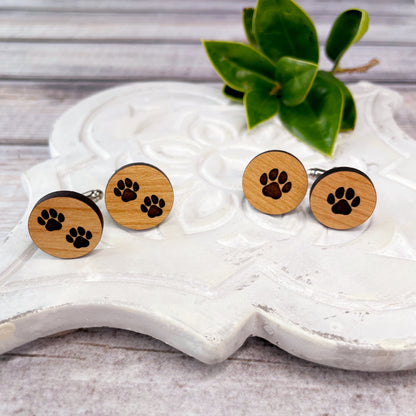 Engraved wooden cufflinks with a paw print